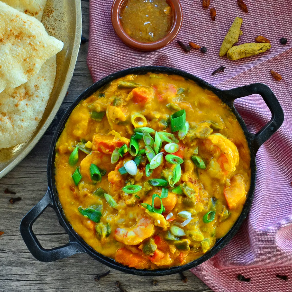 Garnelen und Kürbis in Korma-Simmersoße