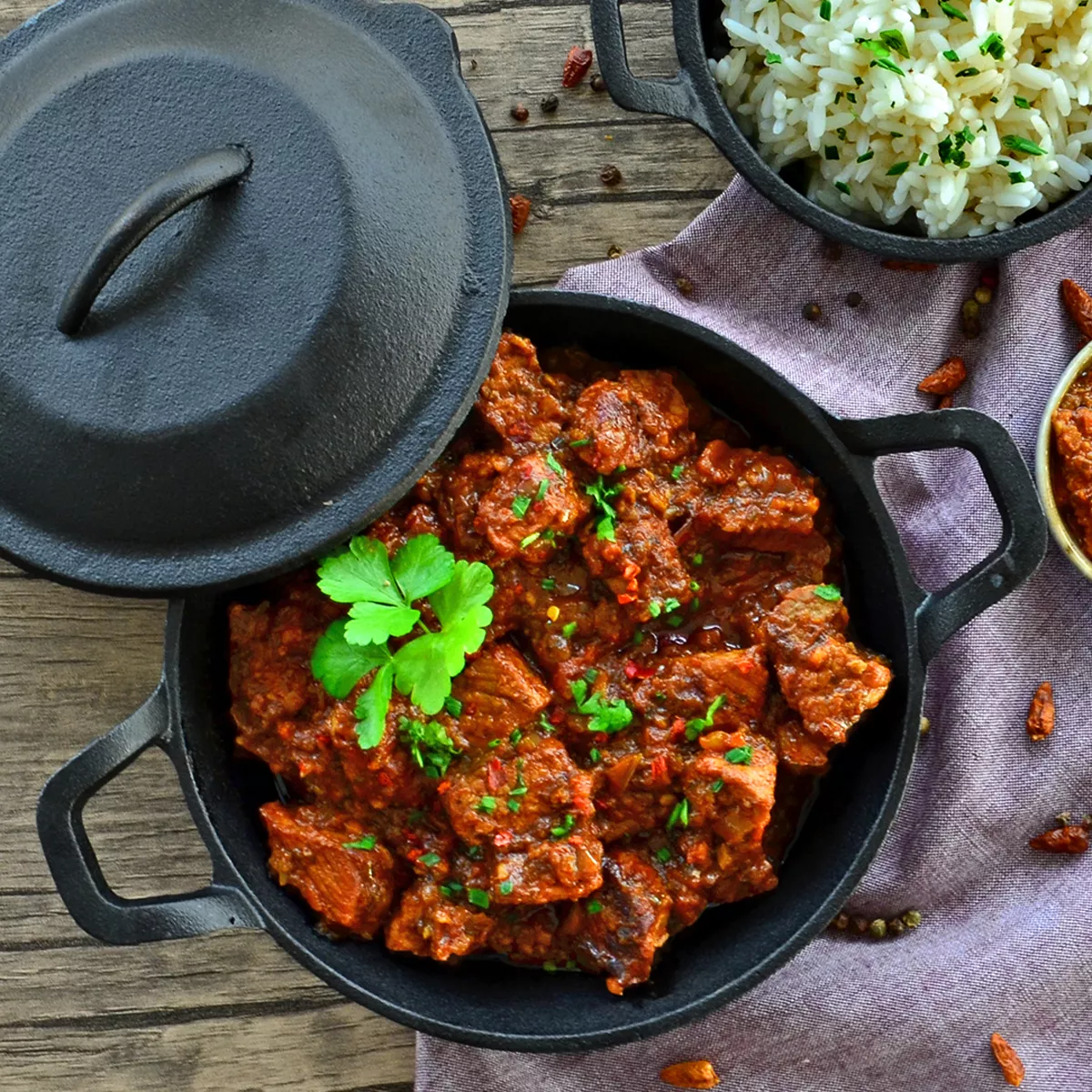 Schweinefleisch in Vindaloo-Simmer Sauce